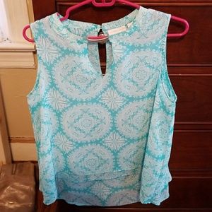 Blue sleeveless blouse